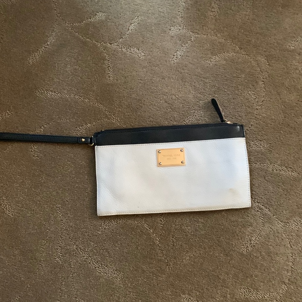 Michael kors black and white wristlet holds all phones gently used